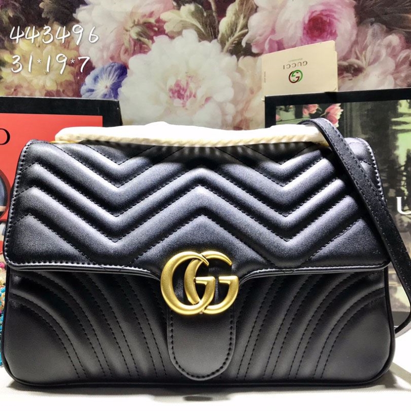 G*u*i satchel bags